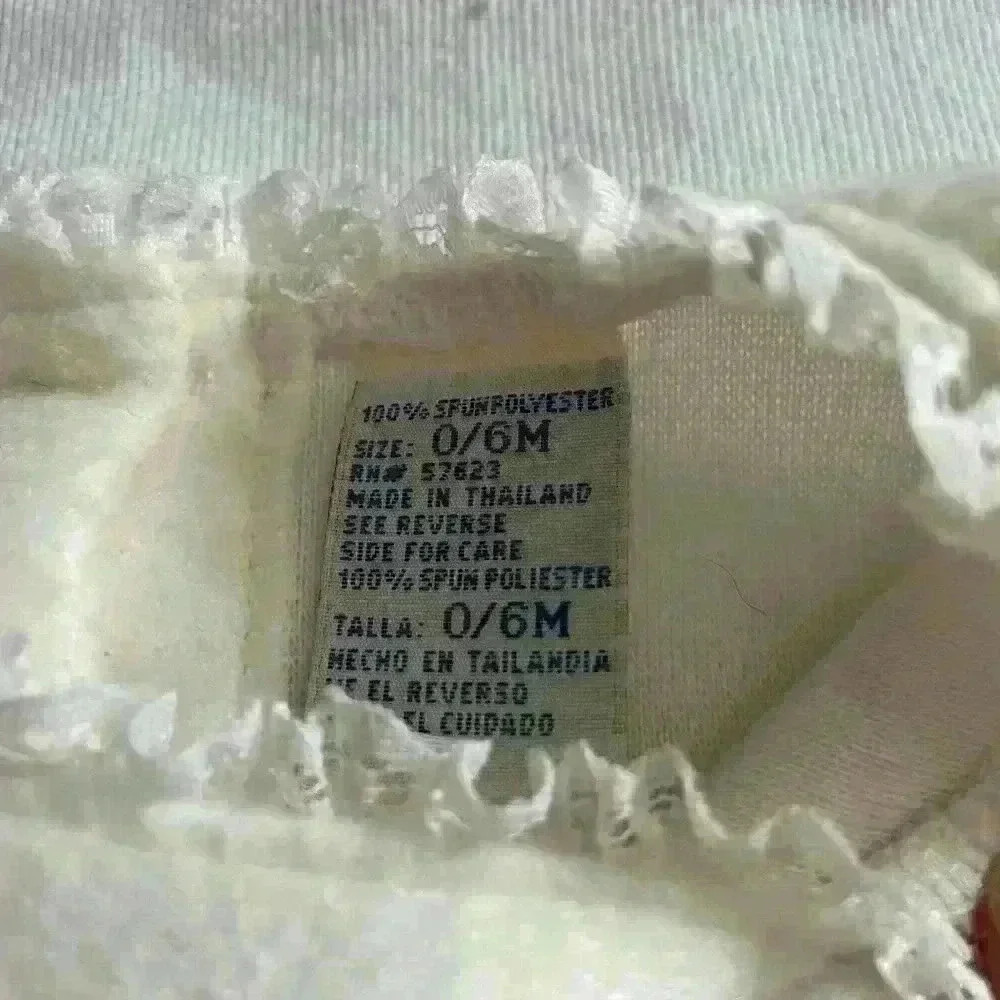 Little Lindsey Off-White top with embroidered red flowers, button back lace trim - Picture 6 of 6